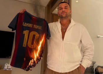 An Israeli burns a Barcelona FC t-shirt bearing Lamine Yamal's name