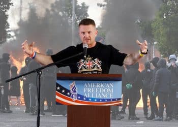 Tommy Robinson in front of Belfast white rioters