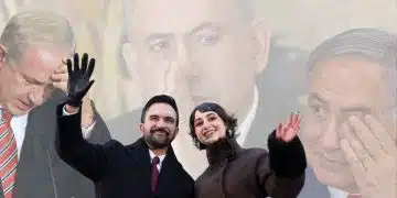 Zohran Mamdani waving to a crowd in front of a collage of images of Benjamin Netanyahu crying