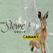 An image of a pack of hounds catching a hare at a fence line. In the foreground is Stowe School's logo and next to it is a european brown hare and the Canary logo