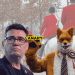 An image of the hunt and hounds in the background, wearing the traditional red coats. In the foreground on the left is Robert Pownall dressed as a fox. He is wearing a red, blue and white rosette and is waving at the camera. To the left of him is Andy Burnham looking perplexed. In the middle is the Canary UK logo