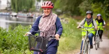 Women cycling along a towpath