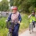 Women cycling along a towpath