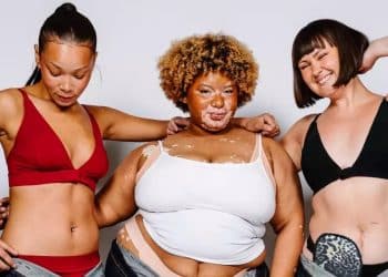 Publicity image for Disability Pride Catwalk Three models wear the Reconditioned Jean