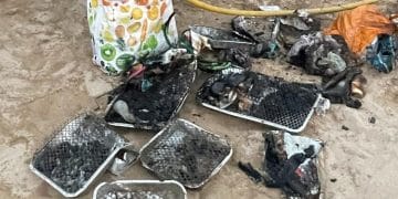 Disposable BBQs littered on beach in Cornwall