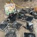 Disposable BBQs littered on beach in Cornwall