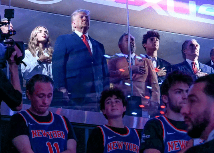 President Donald Trump with his grand daughter Kai Trump (L), Knicks owner James Dolan (3L), US Secretary of the Interior Doug Burgum (3R) and Environmental Protection Agency director Lee Zeldin (2R) attend Game Three of the NBA Finals between the San Antonio Spurs and the New York Knicks at Madison Square Garden in New York on 8 June 2026.