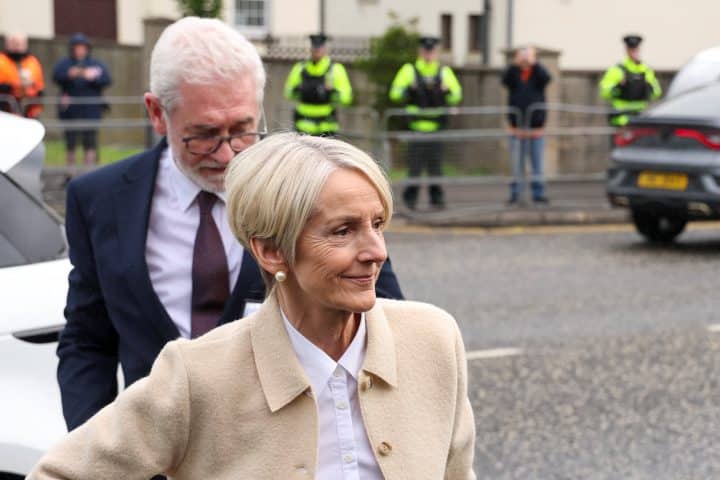 Eleanor Donaldson, co-accused and wife of Jeffrey Donaldson, former leader of the Democratic Unionist Party (DUP) charged with historical sex offences, arrives at Newry Magistrates Court for a preliminary enquiry, in Newry, Northern Ireland, 3 July 2024 and is smiling