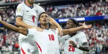 Harry Kane, Jude Bellingham and Noni Madueke celebrate on the pitch during England's winning game against Croatia on 18 July 2026