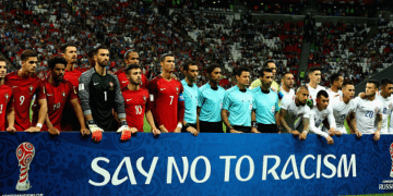Portugal v Chile: Semi-Final - FIFA Confederations Cup Russia 2017 KAZAN, RUSSIA - JUNE 28: Players and match officials line up with an anti racism banner prior to the FIFA Confederations Cup Russia 2017 Semi-Final between Portugal and Chile at Kazan Arena on June 28, 2017 in Kazan, Russia. (Photo by Ian Walton/Getty Images)