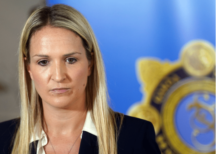 Helen McEntee, Ireland defence minister, looks towards the ground
