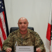 President of Lebanon, Joseph Aoun, in his army uniform with US and Lebanon flag behind him on either side