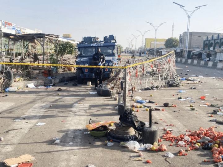 A Nigerian police truck stands at the deserted Maiduguri Monday Market the morning after multiple explosions struck the northeastern city of Maiduguri, Borno State, Nigeria on 17 March 2026
