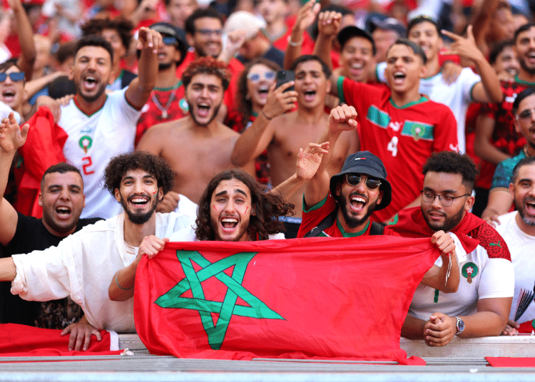 Fans of Team Morocco, some holding flags and others wearing face paint, cheer prior to the Men's semifinal match between Morocco and Spain during the Olympic Games Paris 2024 at Stade de Marseille on August 05, 2024 in Marseille, France.