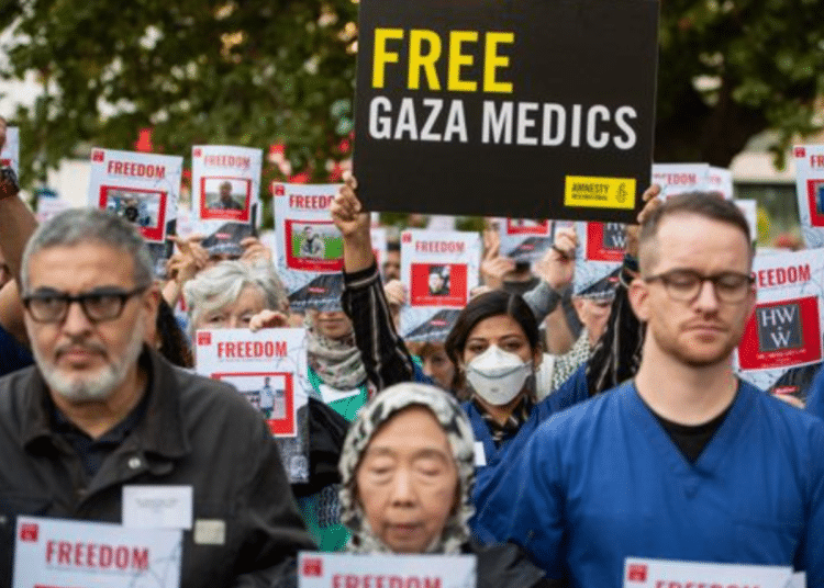 NHS healthcare workers rally for detained Gaza medics