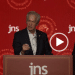A screenshot of a video of Norm Coleman on stage at the The JNS 2026 Summit in Jerusalem in June 2026 where he made the comment about Jews