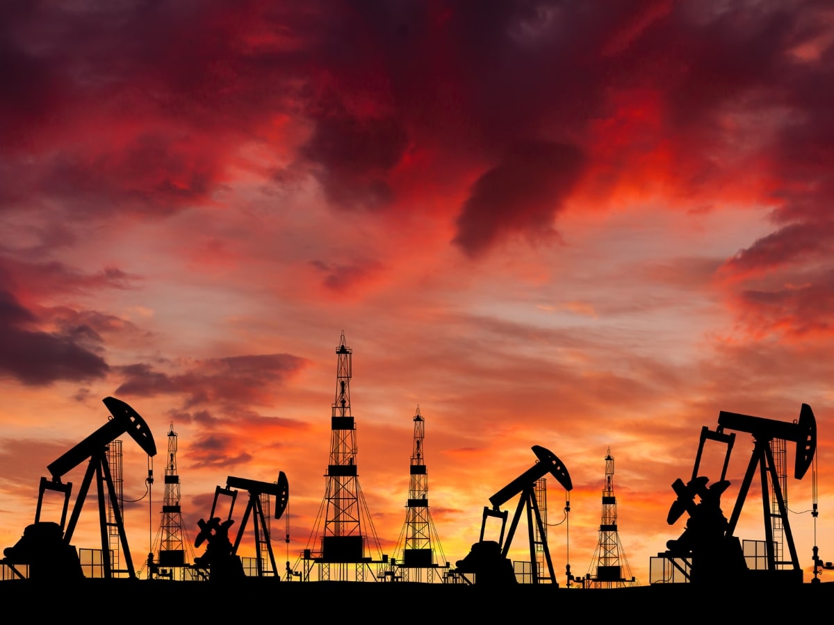 Oil field at sunset, illustrating fossil fuel financing