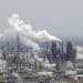 Oil refinery illustrating polluters must pay for heatwave costs