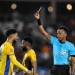 Gabon's forward #20 Denis Bouanga is shown the yellow card by Somali referee Omar Abdulkadir Artan during the Africa Cup of Nations (CAN) Group F football match between Gabon and Ivory Coast at the Grand Stadium in Marrakech on December 31, 2025. (Photo by Khaled DESOUKI / AFP via Getty Images)