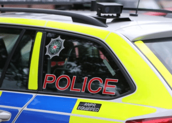A stock image of the side of a PSNI vehicle