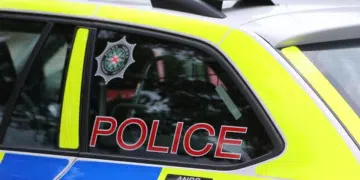 A stock image of the side of a PSNI vehicle