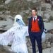 Composite image with gannets in background. In foreground, guga hunt protester Rob Pownall, in gannet costume, and Labour MP Torcuil Crichton