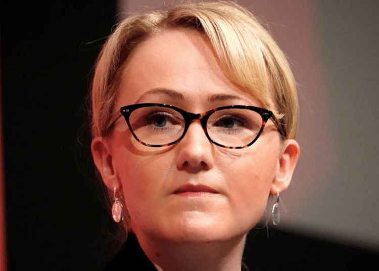 Rebecca Long-Bailey, pictured in March 2020, when she was then Shadow Secretary of State for Business, looks on during the last Labour Party Leadership hustings at Dudley Town Hall, West Midlands. Her expression is determined and she’s straight-faced.