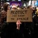 Home made placard saying: Protect The Right To Strike Strike days plummet