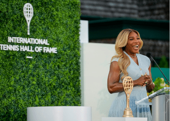 Serena Williams, looking glam in a smart tennis dress, introduces Maria Sharapova during the 2025 Induction Celebration weekend at the International Tennis Hall of Fame in Newport, R.I. on Saturday, August 23, 2025.
