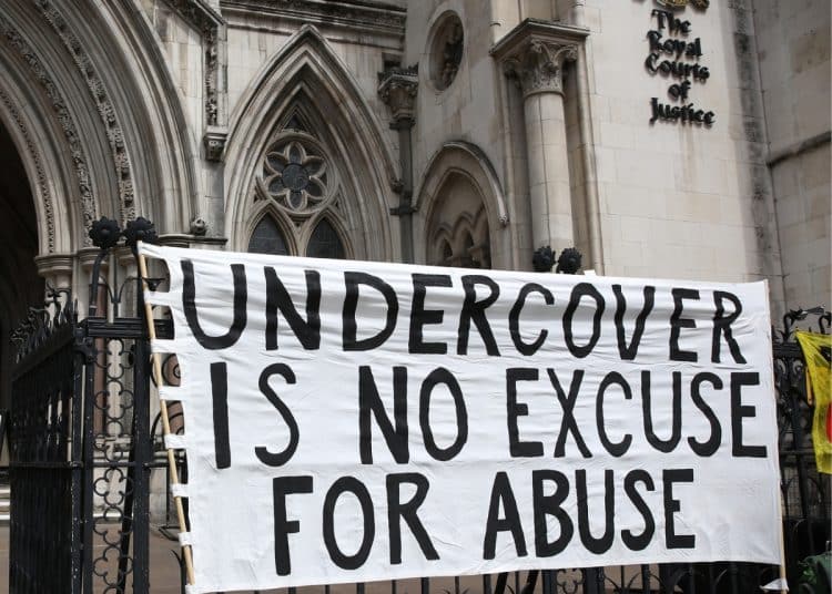 Banner outside Spycops Inquiry saying Undercover Is No Excuse For Abuse
