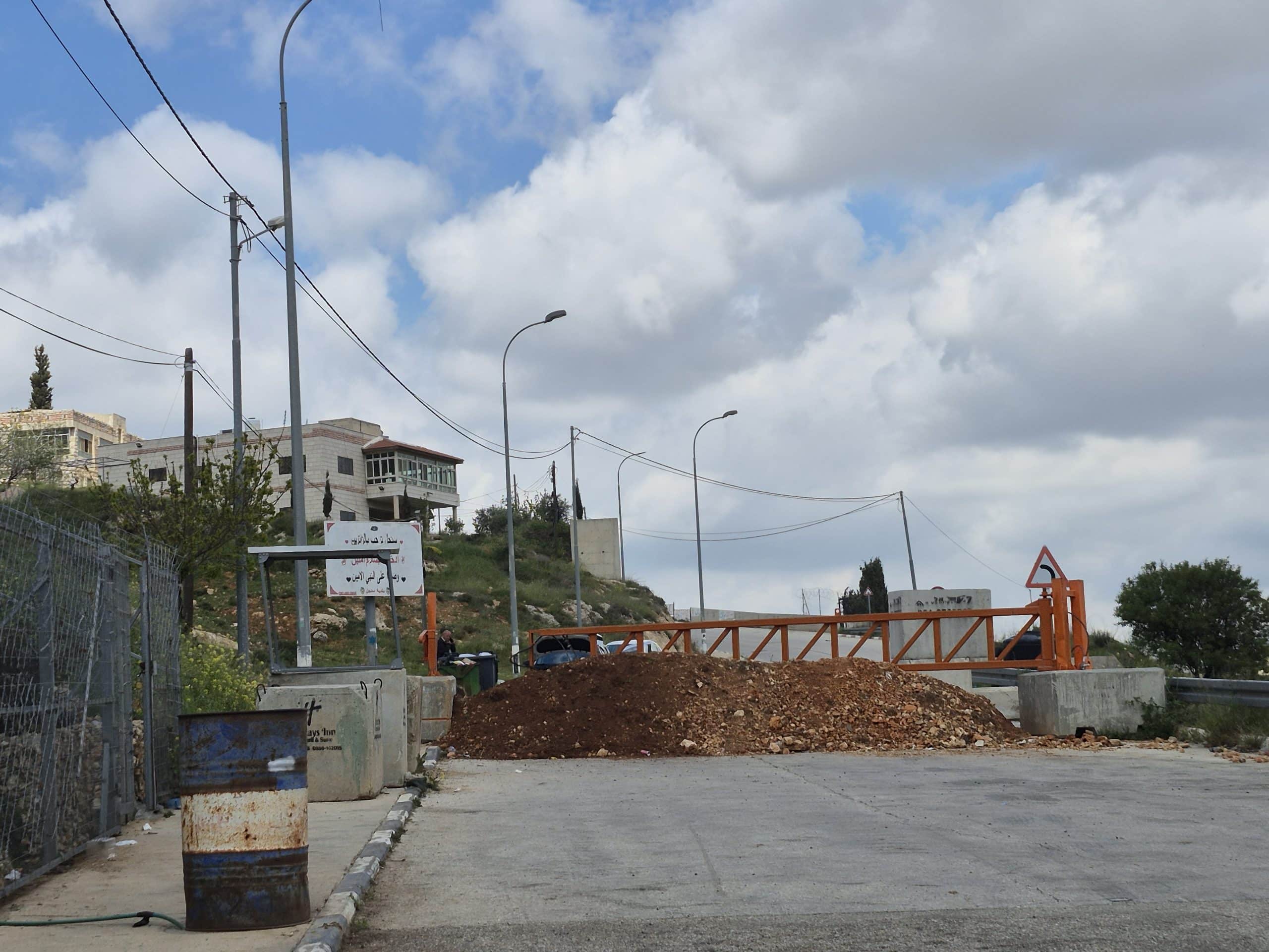 The large gate being referenced in the story. It's long, narrow and stretches across the road in Sinjil, part of the occupied West Bank