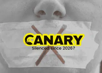 Starmer An image of someone gagged with tape in the background. It has a big red cross on it. In the foreground is the Canary logo, but the Canary on the left hand side has a red cross over it's beak. Underneath the logo it says 'Silenced since 2026?' in black