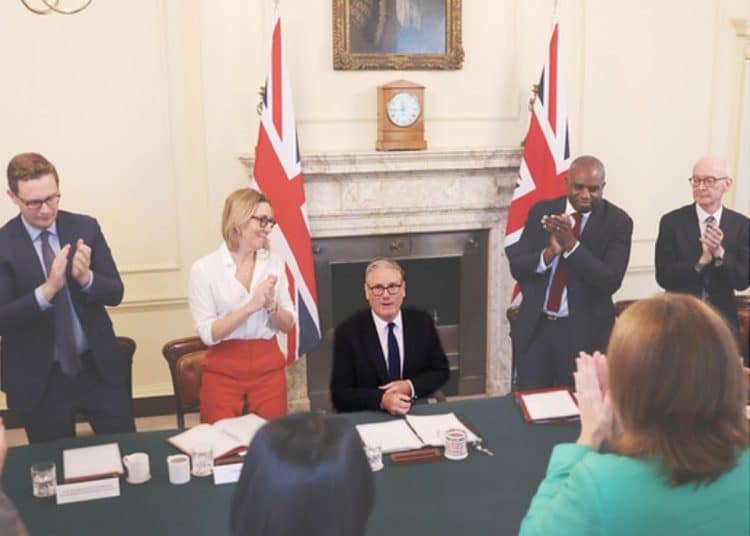 Labour Keir Starmer being applauded by his cabinet