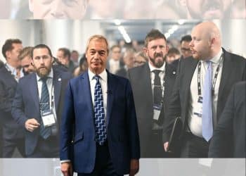 Nigel Farage and a security team