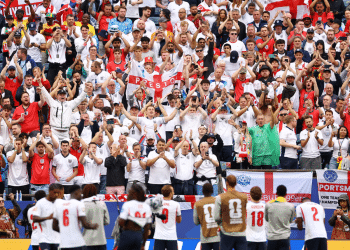England v Ghana at the Boston Stadium, on 23 June 2026. England fans applaud the players after the match from the fans. It's a vivid array of flags, England shirts and red and white