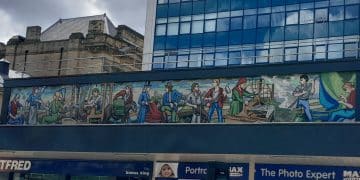 A mural from Huddersfield showing the past jobs of local people.