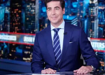 Jesse Watters dressed and ready for recording at the Fox News table