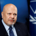 Karim Khan, ex-ICC prosecutor, who has a bald head and piercing eyes, looks stern as he stares into the distance