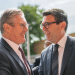 Keir Starmer and Andy Burnham greeting one another and smiling in close proximity
