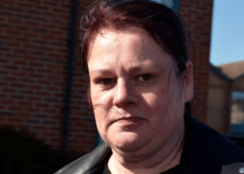 Kerry Wilks, formerly of Unite Community, pictured in 2022, outside looking straight faced at the camera