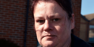 Kerry Wilks, formerly of Unite Community, pictured in 2022, outside looking straight faced at the camera