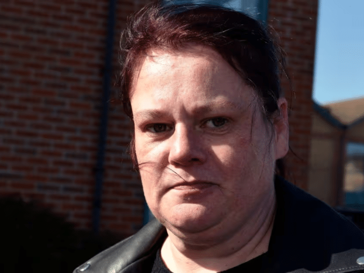 Kerry Wilks, formerly of Unite Community, pictured in 2022, outside looking straight faced at the camera