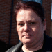 Kerry Wilks, formerly of Unite Community, pictured in 2022, outside looking straight faced at the camera
