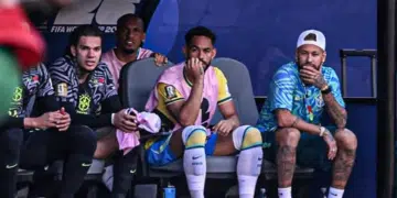 Neymar joins the Brazil team on the bench for their World Cup opener vs. Morocco