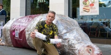 Chris Packham with a 'Frankenwrap' prop outside a branch of Pret A Manger