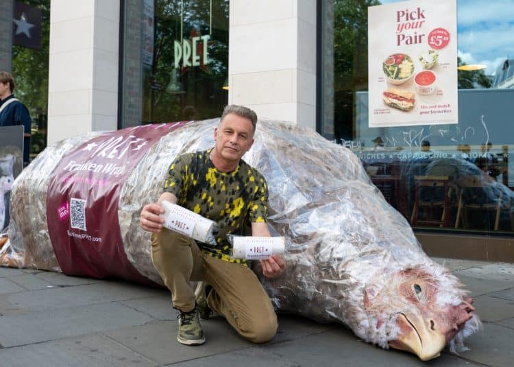 Chris Packham with a 'Frankenwrap' prop outside a branch of Pret A Manger