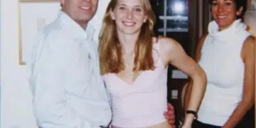 The infamous photo of Prince Andrew with his arm around Virginia Giuffre, 17, in 2001 with convicted sex offender, Ghislaine Maxwell, in the background smiling at the cameraperson too