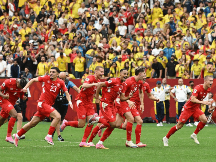 Switzerland team reacts to Vargas' winning penalty to send them to the quarter finals