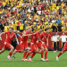 Switzerland team reacts to Vargas' winning penalty to send them to the quarter finals