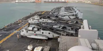 The U.S Navy Wasp-class amphibious assault ship USS Kearsarge arrives for a port visit in Salalah, Oman, on 8 March 2026. Iran is attacking US aircraft support bases.